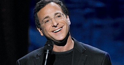Bob while doing stand-up comedy. Know about Saget's career, profession